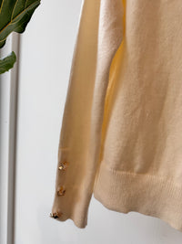 Sweater Ecru golden buttons